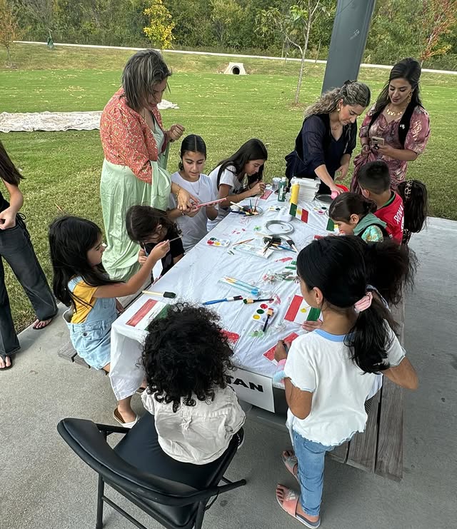 Kurdish children playing cultural games